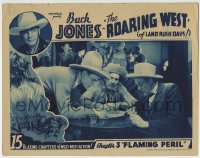 4a774 ROARING WEST chapter 3 LC 1935 cowboy Buck Jones reading map in saloon, Flaming Peril!