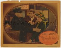 4a959 WE ARE NOT ALONE LC 1939 Paul Muni stops cop from grabbing pretty Jane Bryan, James Hilton!