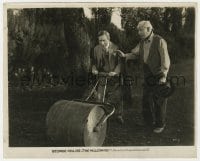 4d679 MILLIONAIRE  8x10 still 1931 old man tries to stop George Arliss pushing huge roller!