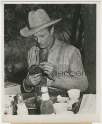 4d265 DALLAS candid 8.25x10 still 1950 Gary Cooper in costume feeding bird from his lunch tray!