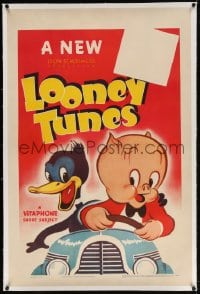 4h287 LOONEY TUNES linen 1sh 1940 Vitaphone, art of Porky Pig driving a car with Daffy Duck!
