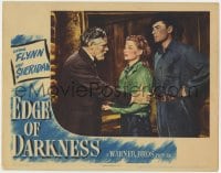 4k233 EDGE OF DARKNESS LC 1942 close up of worried Ann Sheridan & Errol Flynn with Walter Huston!