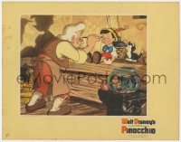 4k293 PINOCCHIO LC 1940 Disney classic cartoon, close up of Gepetto painting the puppet's face!