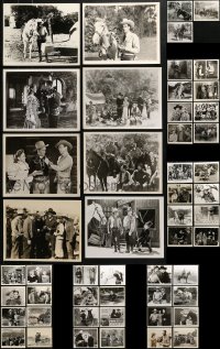 5a461 LOT OF 67 WESTERN 8X10 REPRO PHOTOS 1980s great scenes from a variety of cowboy movies!