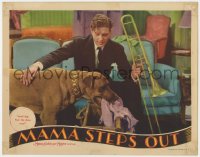 5b560 MAMA STEPS OUT LC 1937 musician Dennis Morgan's giant dog helps him pack his bags!