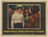 5b705 REBEL WITHOUT A CAUSE LC 1955 c/u of James Dean, who doesn't fit in at his new school!