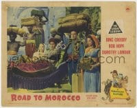 5b726 ROAD TO MOROCCO LC 1942 Bob Hope is porter for Bing Crosby & Dorothy Lamour in sedan chair!