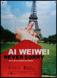 5j049 AI WEIWEI: NEVER SORRY French 1p 2012 great image of middle finger pointed at Eiffel Tower!