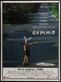 5j408 GUMMO French 1p 1997 wacky image of half-naked man on skateboard & wearing bunny hat!