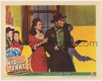5m581 KID FROM TEXAS LC #7 1950 Audie Murphy with two guns drawn protecting pretty Gale Storm!