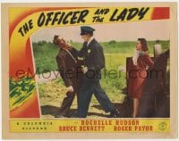 5m646 OFFICER & THE LADY LC 1941 Bruce Bennett saves Rochelle Hudson by knocking out bad guy!
