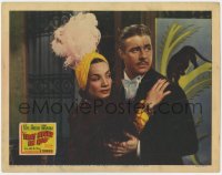5m760 THAT NIGHT IN RIO LC 1941 close up of Don Ameche holding Carmen Miranda in feathered outfit!