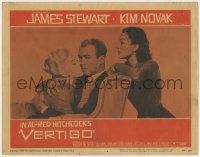 5w920 VERTIGO LC #6 1958 Hitchcock, James Stewart hugs blonde Kim Novak with brunette Kim behind!