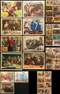 5x086 LOT OF 43 WESTERN LOBBY CARDS 1940s great scenes from a variety of cowboy movies!