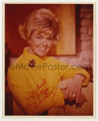 6b650 DORIS DAY signed color 8x10 REPRO still 1980s smiling portrait wearing yellow coat!