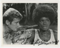 6b785 GLORIA HENDRY signed 8x10 REPRO still 1980s held at gunpoint by Roger Moore as James Bond!