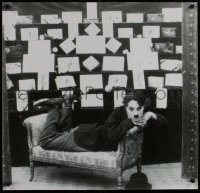 6g289 CHARLIE CHAPLIN 27x29 commercial poster 1990s as The Tramp on sofa next to chocolates!