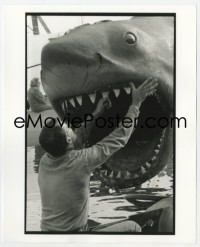6h004 JAWS deluxe candid 8x10 file photo 1975 c/u of crew member adjusting Bruce the shark's teeth!