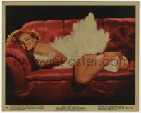 6h070 PRINCE & THE SHOWGIRL color 8x10 still #8 1957 sexy Marilyn Monroe on red couch with feathers!