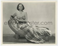 6h791 ROSALIND RUSSELL deluxe 8x10 still 1940s sexy portrait in strapless dress seated on divan!