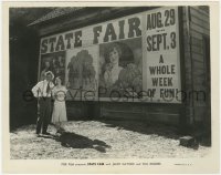 6h852 STATE FAIR 8x10 still 1933 Will Rogers & Janet Gaynor stanidng by enormous poster!