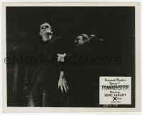 6h035 FRANKENSTEIN English FOH LC R1957 close up of monster Boris Karloff attacked from behind!