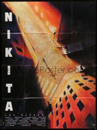 6k753 LA FEMME NIKITA French 1p 1990 Luc Besson, cool overhead art of Anne Parillaud in alley!
