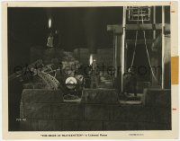 6w307 BRIDE OF FRANKENSTEIN 8x10.25 still 1935 Boris Karloff as the monster fighting on tower!