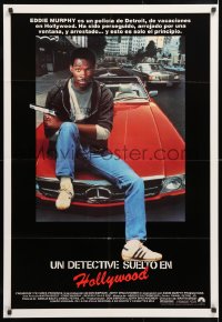 6y150 BEVERLY HILLS COP Spanish 1984 great image of detective Eddie Murphy sitting on red Mercedes!
