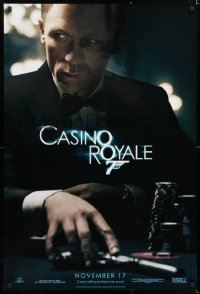 6z586 CASINO ROYALE teaser DS 1sh 2006 Craig as James Bond sitting at poker table w/gun!