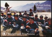 6z494 WORLD FOOD PROGRAMME 19x27 special poster 2000 children being fed in Bhutan!