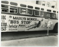7f219 BUS STOP candid 7.5x9.5 still 1956 ad with Marilyn Monroe on side of bus, Mann Chinese Theatre