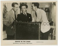 7f297 DENTIST IN THE CHAIR 8x10.25 still 1961 Kenneth Connor shows contents of trunk to two men!