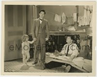 7f735 PACK UP YOUR TROUBLES 8x10.25 still 1932 Stan Laurel & Oliver Hardy take care of baby girl!