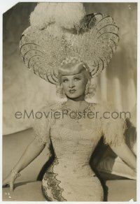 7h288 MAE WEST 8x11.75 still 1940s sexy seated portrait in elaborate gown & headdress by Richee!