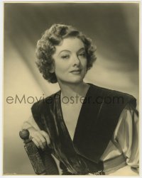 7h322 MYRNA LOY deluxe 11.25x14.25 still 1940s seated portrait of the MGM leading lady in velvet!