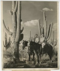 7h123 BOMBSHELL deluxe 10x12 still 1933 Jean Harlow & Franchot Tone riding horses in the desert!