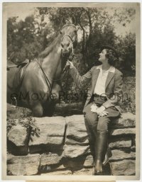 7h271 LIBELED LADY candid deluxe 10x13 still 1936 Myrna Loy proves she's an excellent horsewoman!