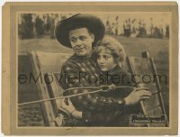 7p181 CROSSING TRAILS LC 1921 close up of Pete Morrison & Esther Ralston bound together with lasso!