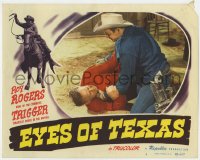 7p263 EYES OF TEXAS LC #3 1948 close up of Roy Rogers kneeling to help man on the ground!