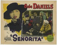 7p782 SENORITA LC 1927 Bebe Daniels in mustache disguise makes face after drinking!