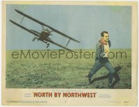 8a095 NORTH BY NORTHWEST LC #2 1959 Hitchcock, classic c/u of Cary Grant chased by crop duster!