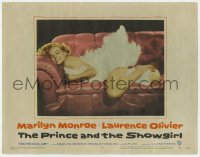 8a098 PRINCE & THE SHOWGIRL LC #6 1957 sexiest Marilyn Monroe smiling on red couch in feathers!