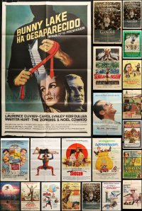8d144 LOT OF 40 FOLDED SPANISH LANGUAGE ONE-SHEETS 1950s-1990s a variety of movie images!