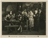 8g712 PLAYING WITH SOULS 8x10.25 still 1925 rich society people looking at table of commoners!