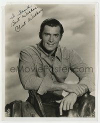 8p852 CLINT WALKER signed 8x10 REPRO still 1980s great smiling portrait by saddle from Cheyenne!
