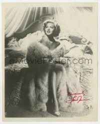 8p924 LANA TURNER signed 8x10 REPRO still 1980s the sexy star wearing only a fur coat in bed!