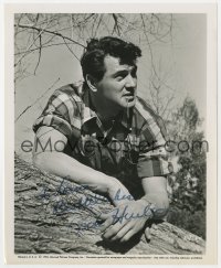 8p621 ROCK HUDSON signed 8.25x10 still 1953 great handsome close up in plaid shirt leaning on tree!