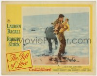 8p048 GIFT OF LOVE signed LC #2 1958 by Robert Stack, who's carrying little girl on the beach!