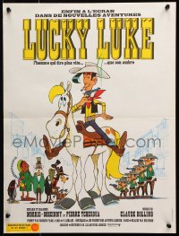 9b747 LUCKY LUKE French 16x21 1971 great cartoon art of the smoking cowboy hero on his horse!
